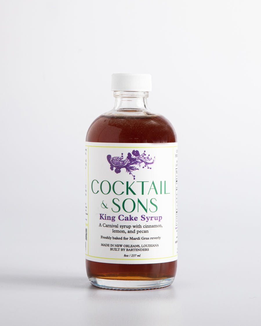 Cocktail and Sons King Cake Syrup beings the flavors of carnival season right to you! With notes of Cassia bark, Louisiana pecans and lemon peels, it is the perfect addition to a brandy milk punch  